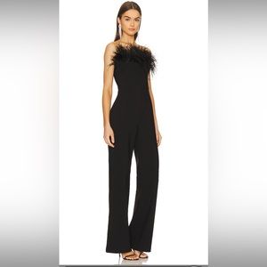 LIKELY jumpsuit black with feather size 00 rare. Fits like a size 0